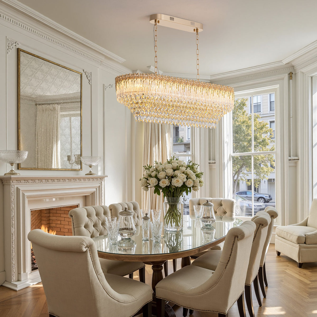 Lámpara de araña rectangular de cristal Hielora – en un comedor con chimenea
