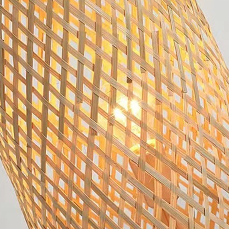 Lámpara de pie de bambú Bambela – detalle del tejido de bambú con luz cálida