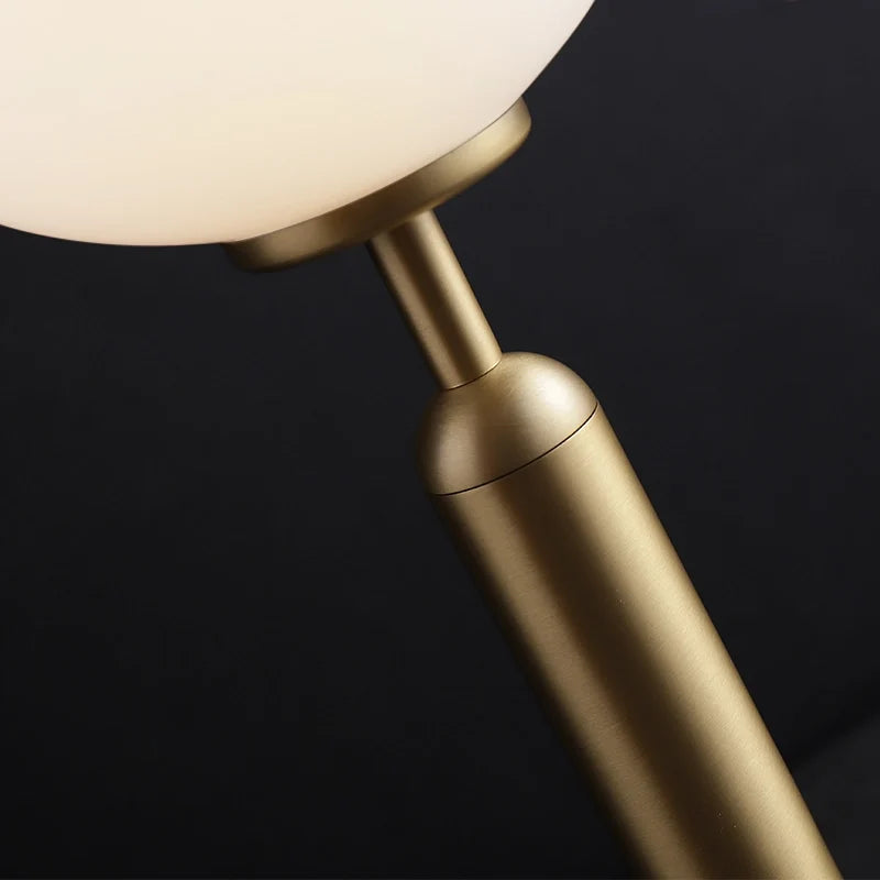 Lámpara de mesa globo Sferla – detalle de la unión entre el globo y el pie