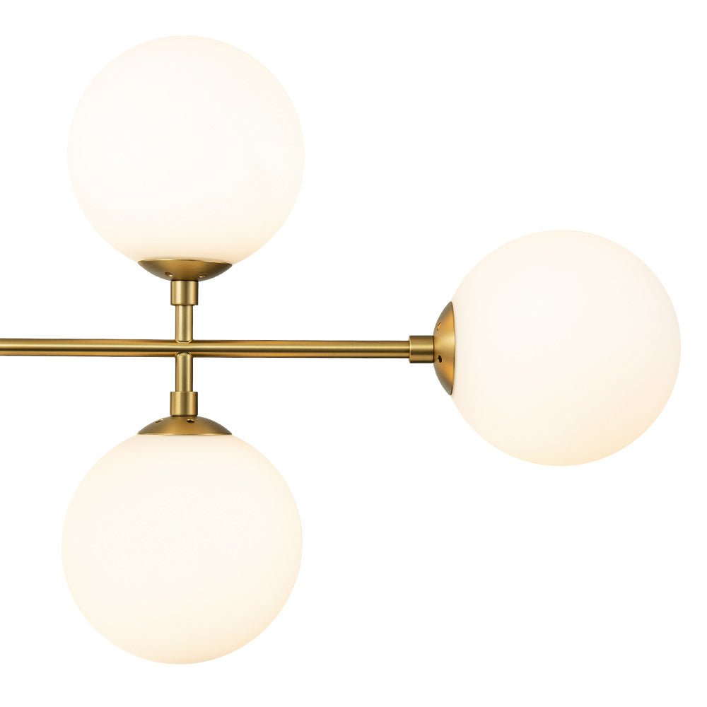 Lámpara de araña sputnik Kosmira sobre una mesa de comedor – imagen 11