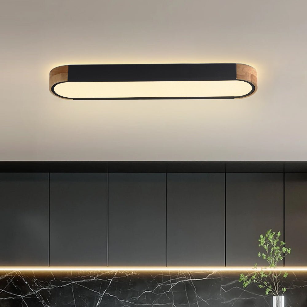 Plafón LED ovalado Hayela – negro, luz cálida