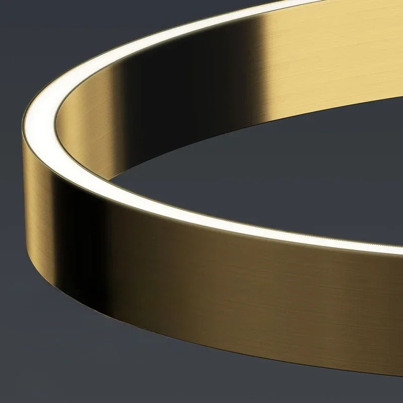 Lámpara de pie arco LED Pamira con aro de luz – detalle del aro dorado