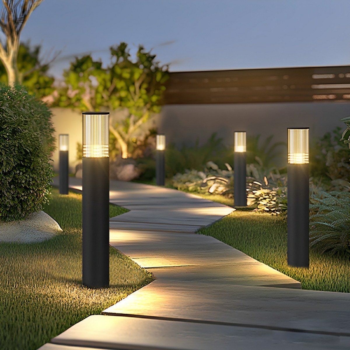 Baliza exterior LED Mostela en un jardín – imagen 7