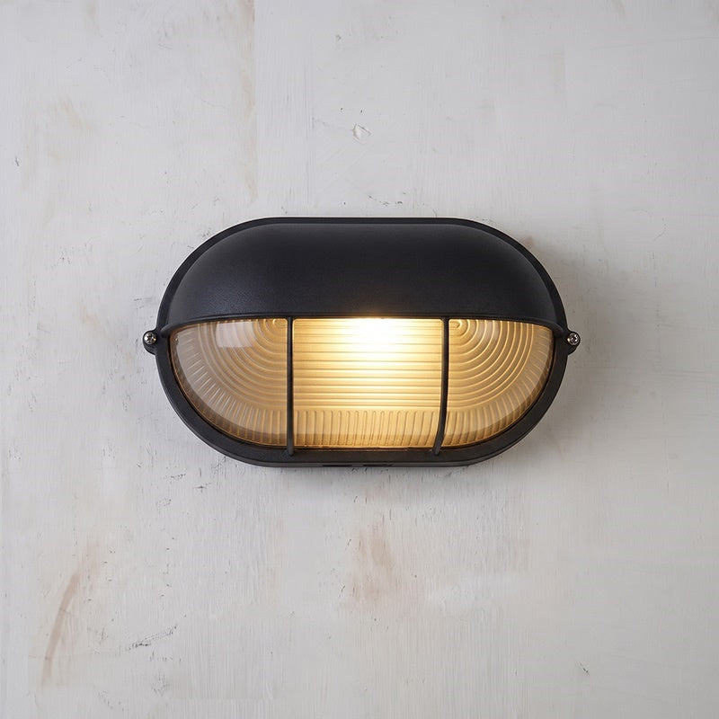 Aplique de pared exterior estilo marinero Molara – ovalado con rejilla en negro