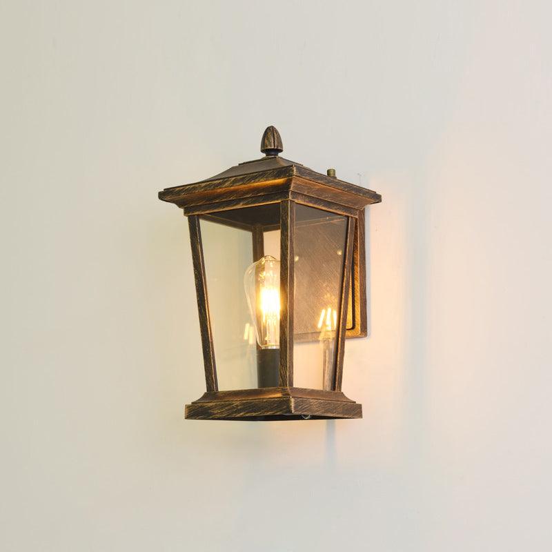 Farol de pared exterior Monfaro – bronce envejecido con vidrio transparente