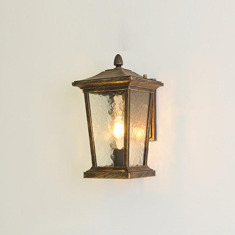 Farol de pared exterior Monfaro – bronce envejecido con vidrio efecto agua