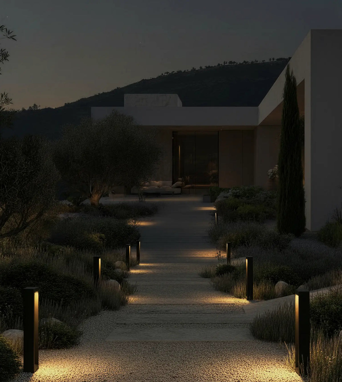 Baliza de jardín LED Nadira en un jardín mediterráneo – imagen 7