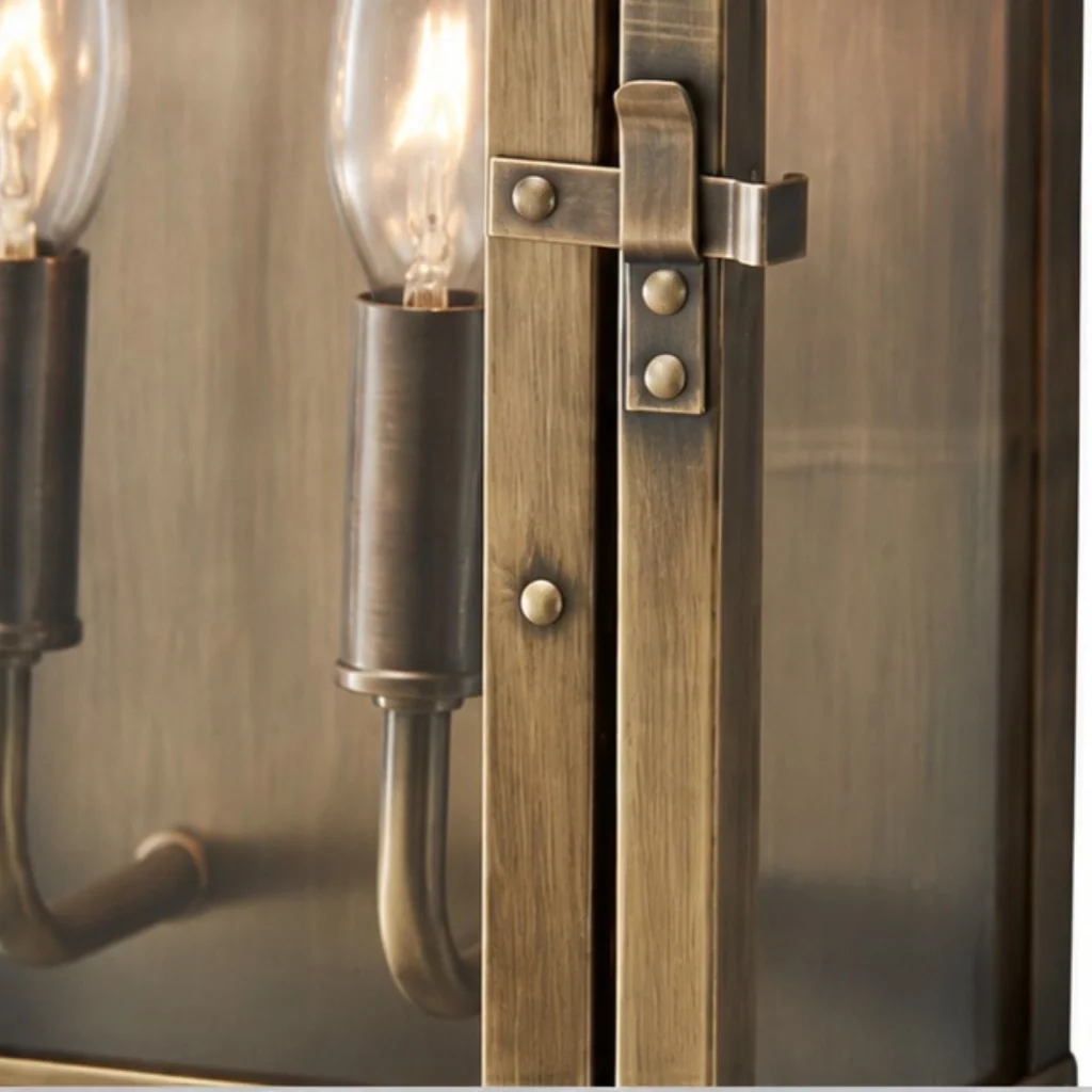 Farol de pared exterior Ocandia – detalle de las velas y los remaches