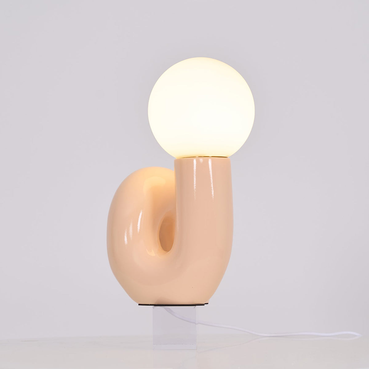Lámpara de mesa escultural Rizeta – rosa vista de frente