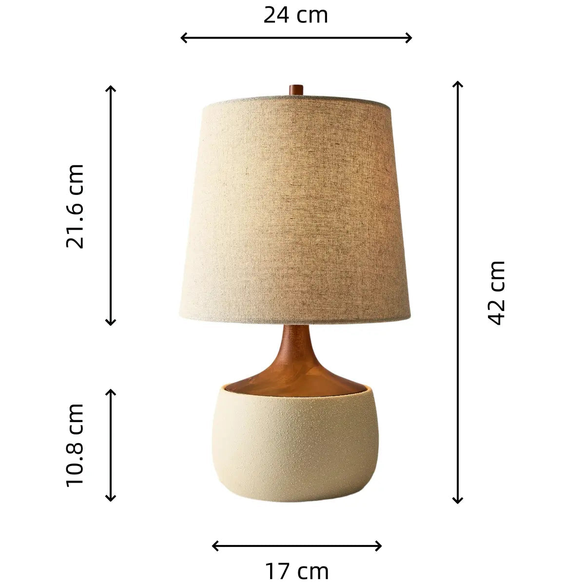 Lámpara de mesa de cerámica y lino Senuva sobre una mesa auxiliar junto al sofá – imagen 19