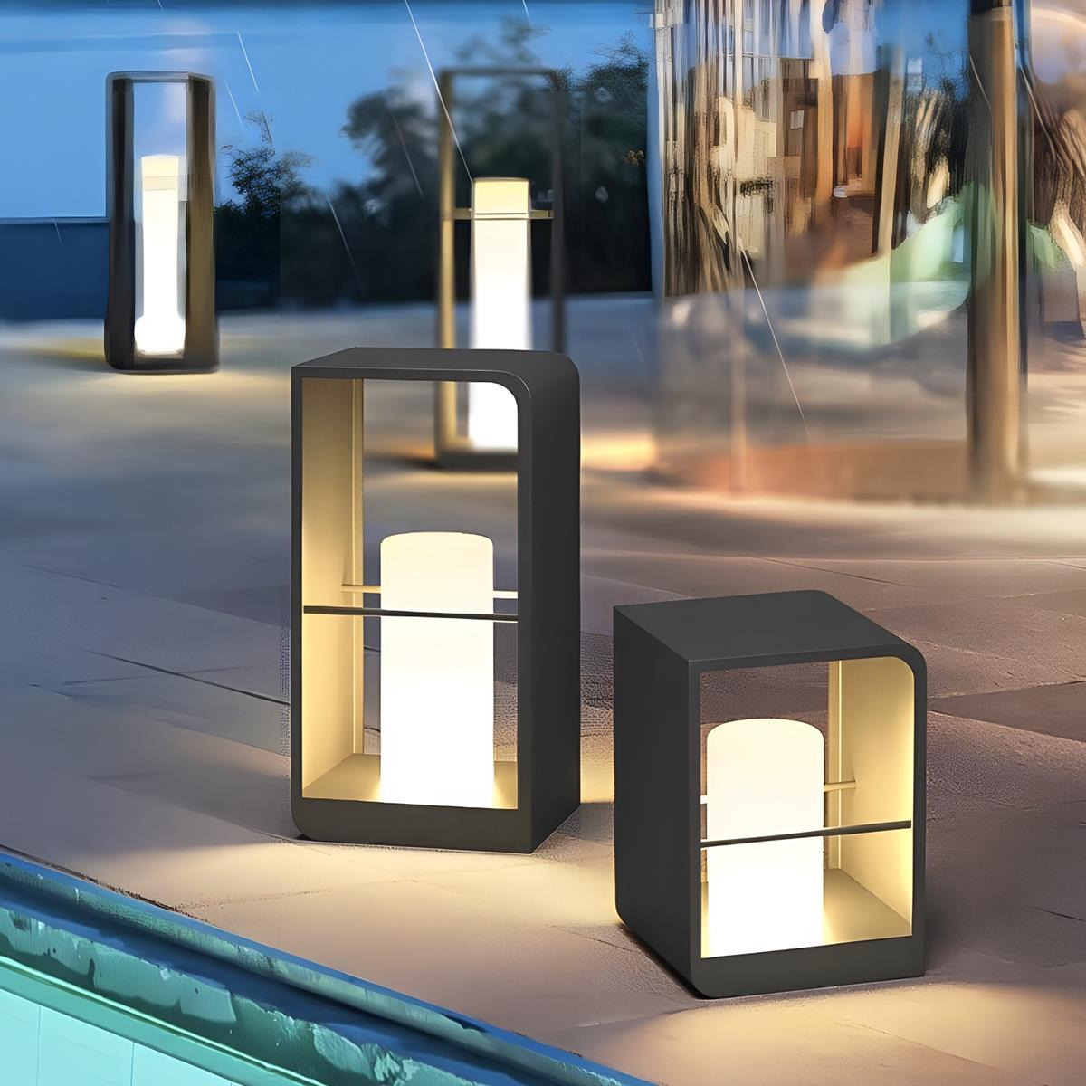 Farol LED de jardín Molvela – tres alturas junto al agua