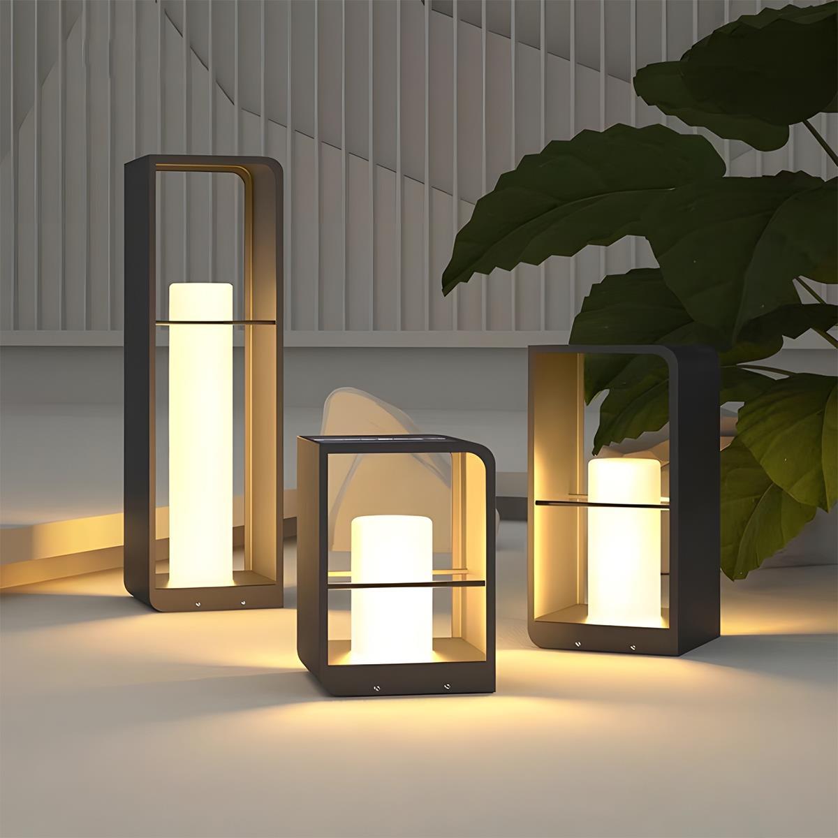 Farol LED de jardín Molvela – tres alturas en un patio