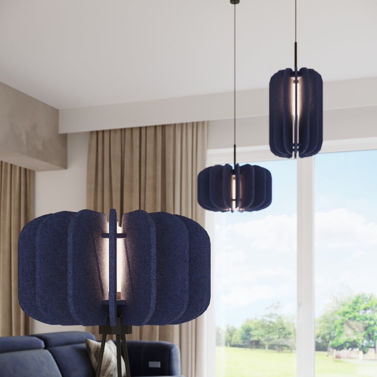 Lámpara de pie Yumara con pantalla de fieltro – en azul marino en un salón luminoso