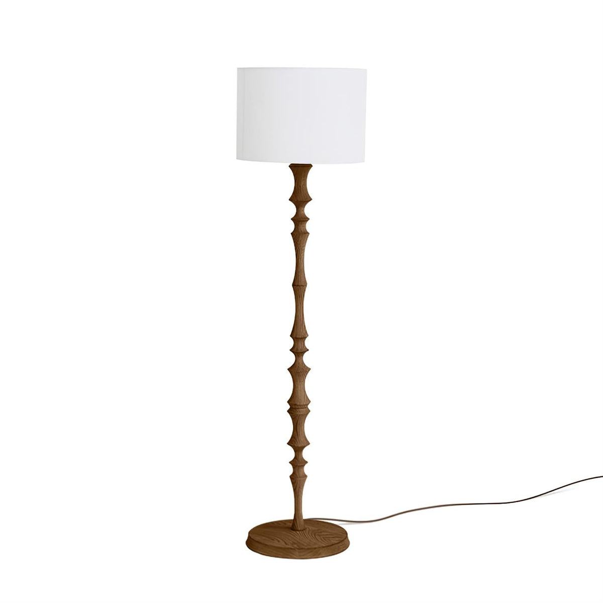 Lámpara de pie de madera torneada Tornelia – en nogal con pantalla de lino
