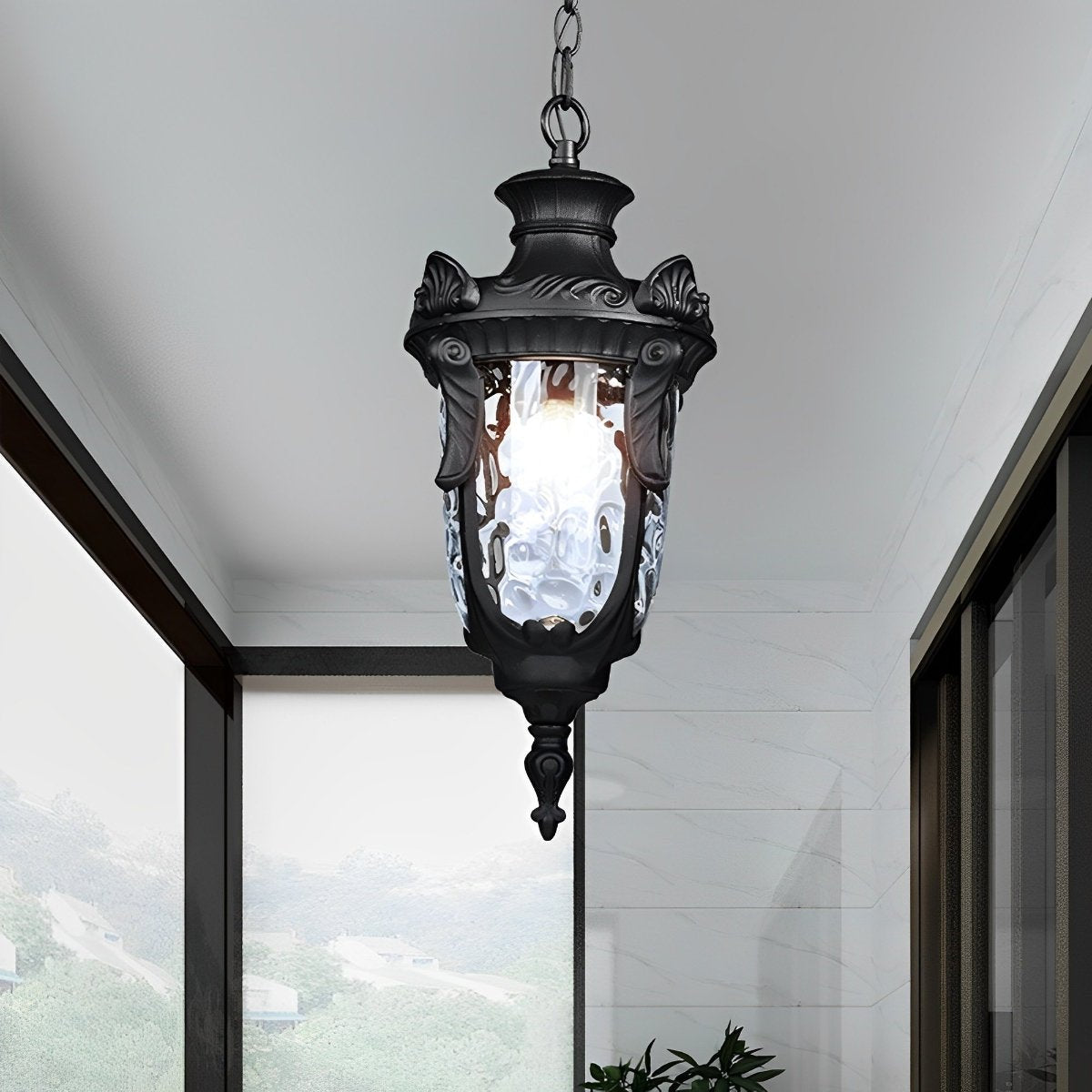 Farol colgante de exterior Ifalo – en negro bajo un techo blanco